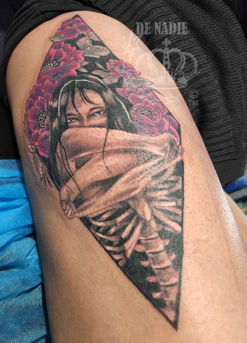 Skeleton girl tattoo done by Infierno